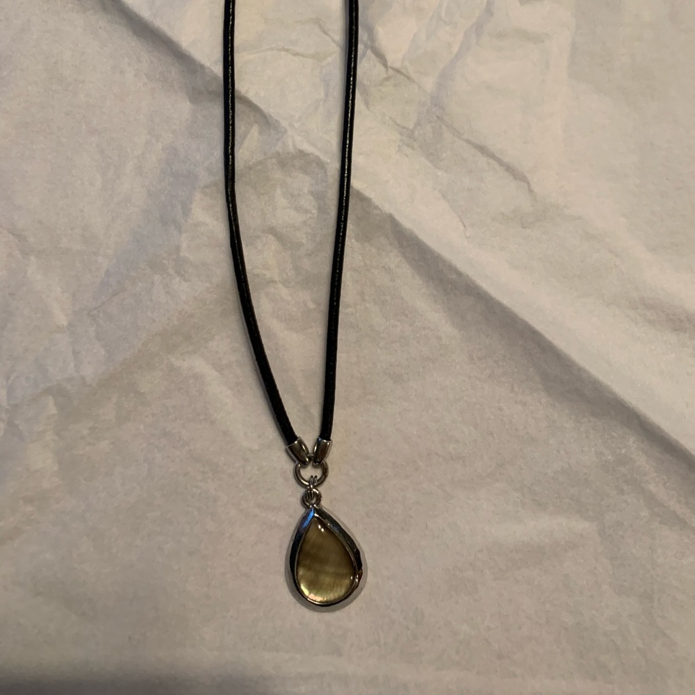Lia Sophia black rope necklace with pendant.